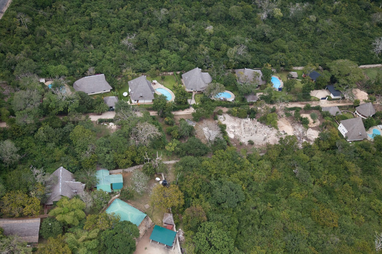 Msitu Kwetu · close-up aerial of homes with private pools and gardens